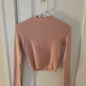 Pink mock turtleneck from Brandy Melville.